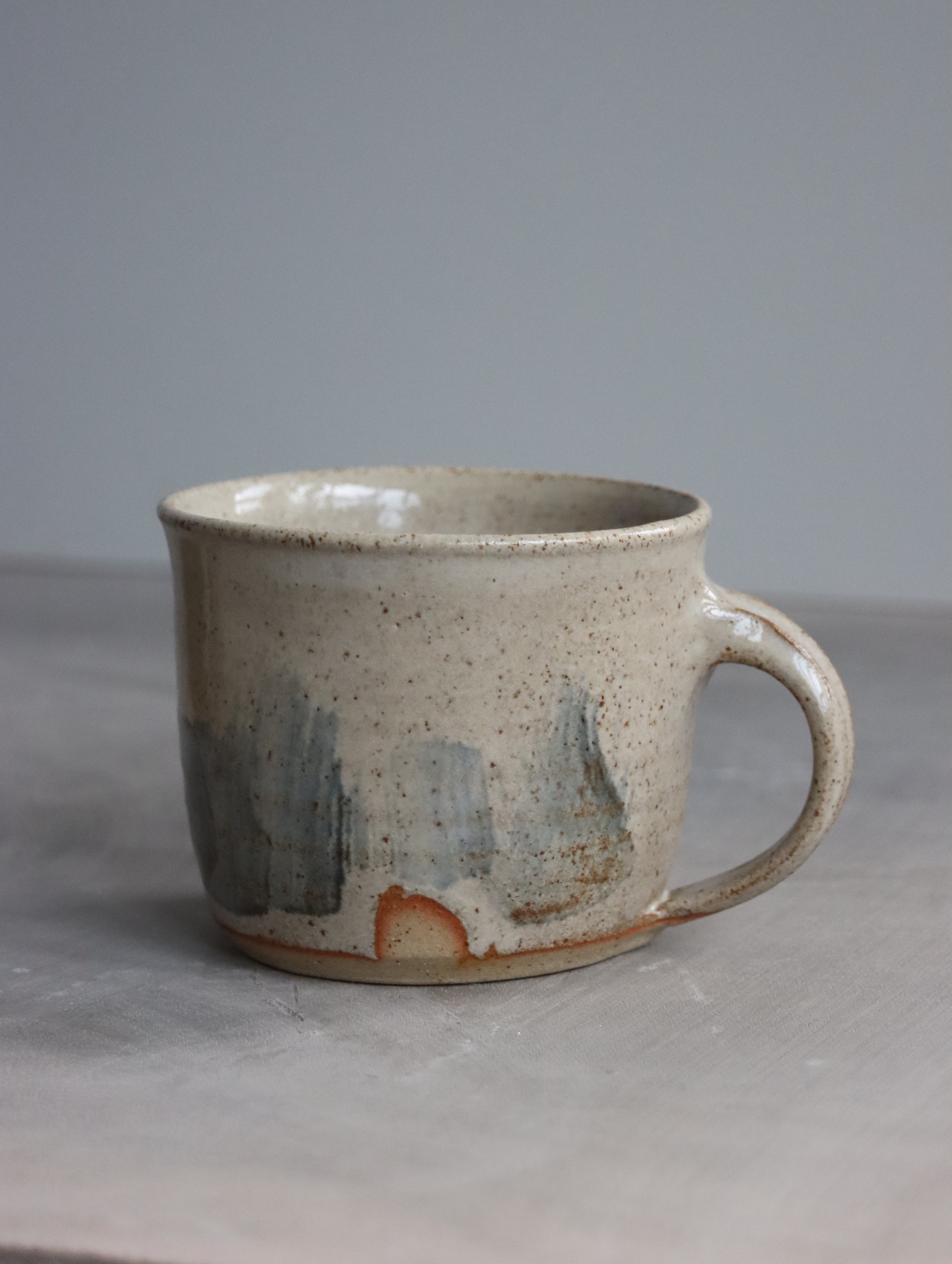 Coffee Cup in Deep Speckle White and Blue Brushwork (7oz)