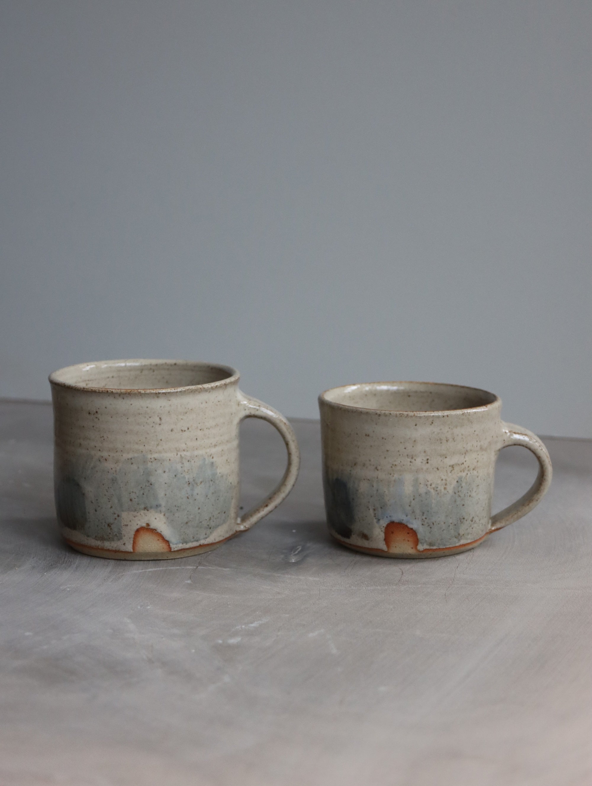 Coffee Cup in Deep Speckle White and Blue Brushwork (7oz)