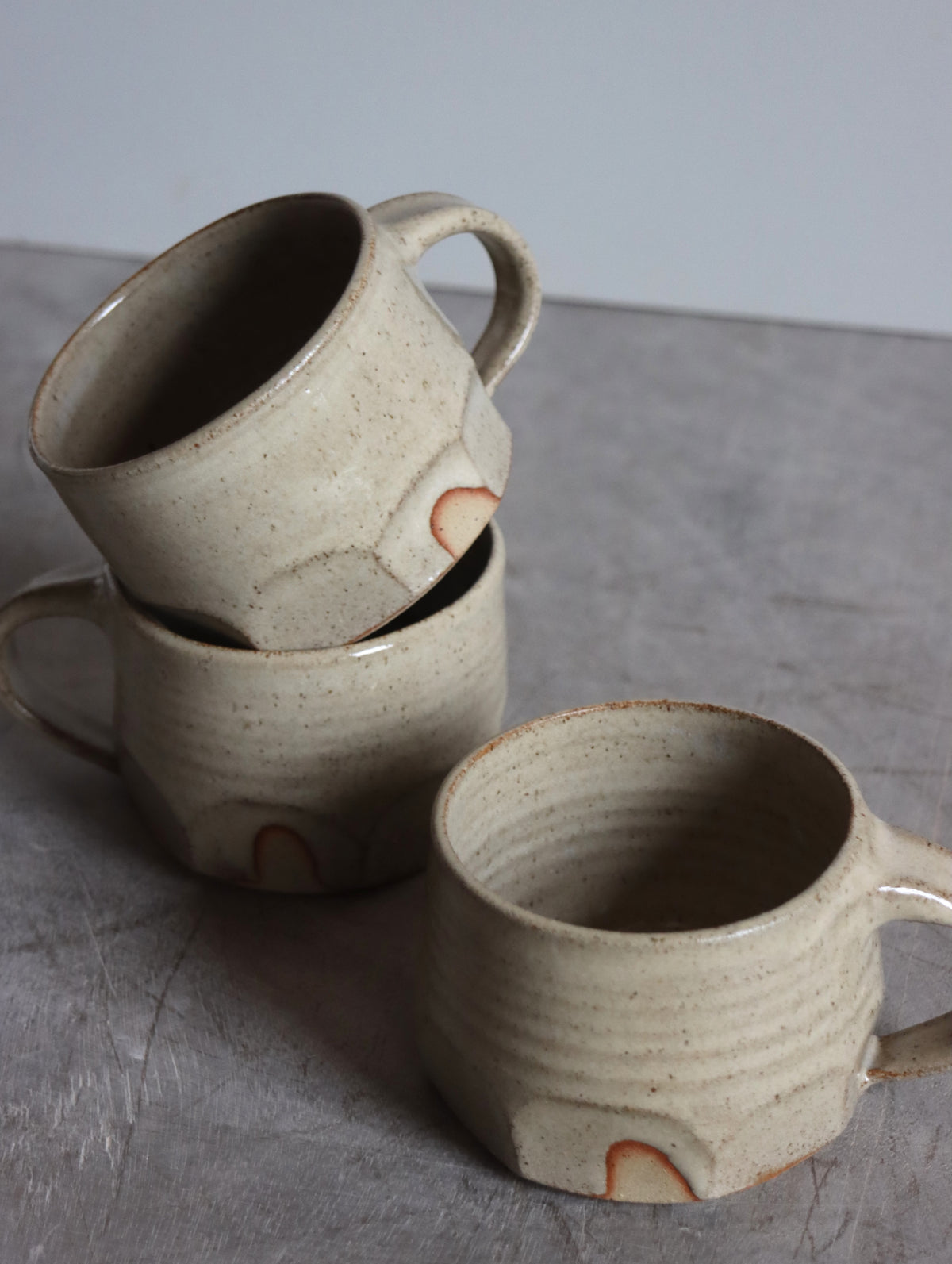 Faceted Coffee Cup in White Speckle (7oz)